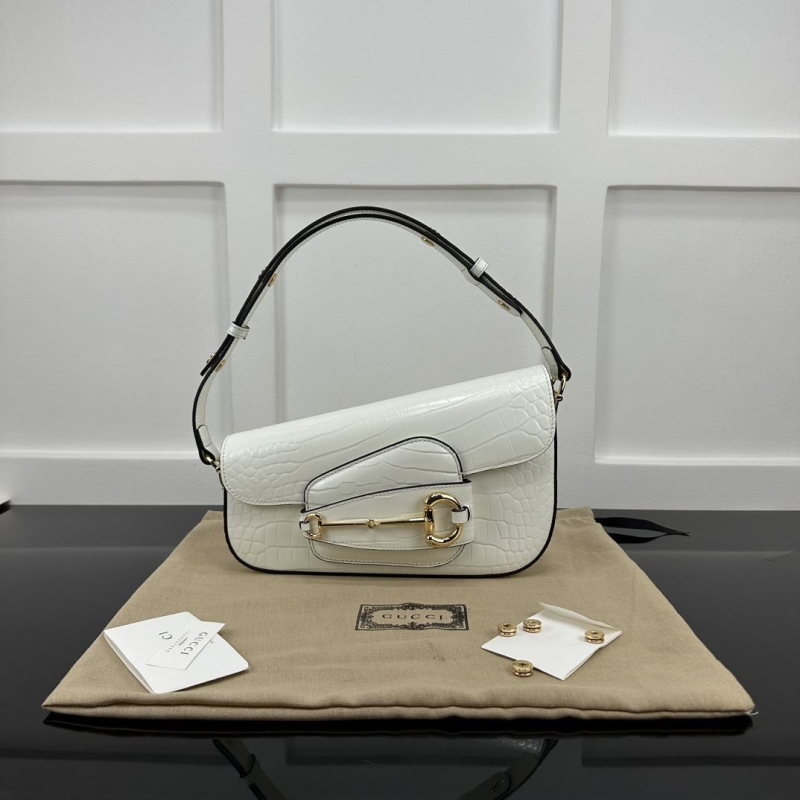 G*u*i top handle bags
